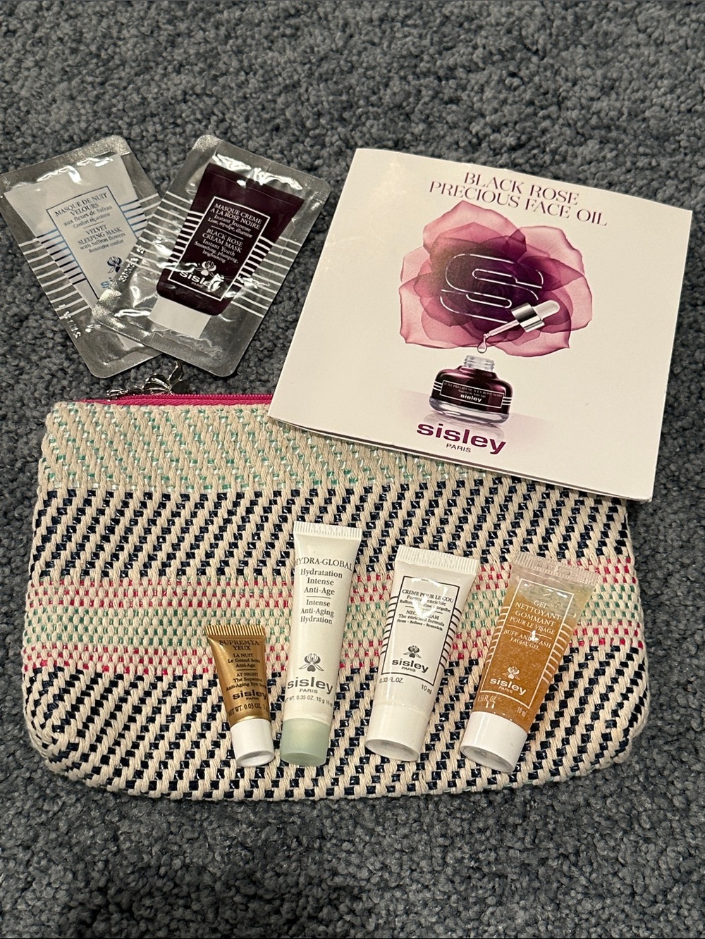 Sisley Travel Skincare Set with Pink, Black & Cream Woven Pouch
